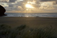 Sonnenuntergang am Strand von Piha